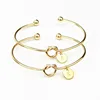 Amazon Best Selling Gold IP Plated Lucky Alloy Cuff Heart Knot Bracelet Bangle With 26 Letters Charms