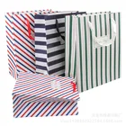 2017 New Qrrival Custom Printed clothes shopping kraft paper bag