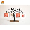 Wholesale Simple Orange Black iron tabletop hollow out multi 4 in 1 tabletop bird decoration metal photo picture frame