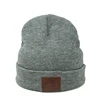 wholesale custom knit slouchy merino wool cheap beanie hat with custom leather label