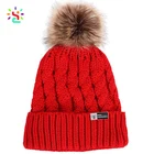 Wholesale fashion knitted beanie hats custom faux fur pompom plain Christmas gift beanies