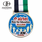run for education 10km finisher custom molded gold medal