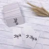 OEM clothing paper hang tags custom brand name garment tag