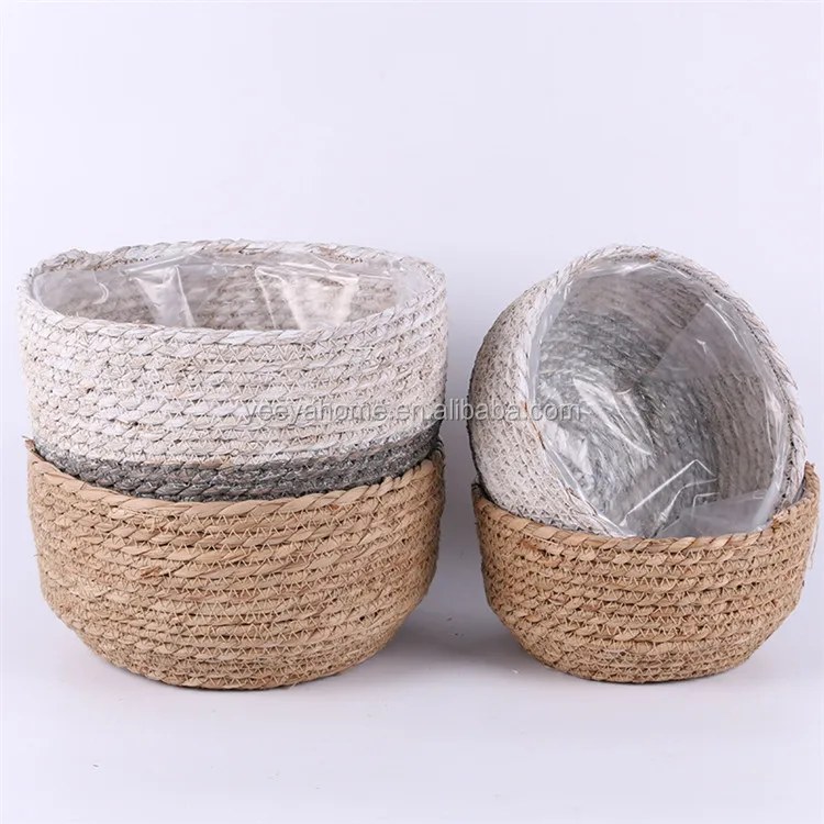white and grey natural rattan seagrass round plant basket with