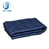 Quilted woven moving blankets for furniture protection