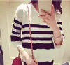 The spring autumn Korean women's striped short sleeve sweater female knitwear shirt split loose fashion tops