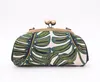 /product-detail/wholesale-fashion-kiss-lock-clasp-purse-palm-leaves-clutch-bag-60806308412.html