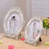 /product-detail/new-1-pc-vintage-european-style-golden-slivery-photo-frame-for-table-quality-resin-picture-frames-for-wedding-marcos-de-foto-60794619608.html