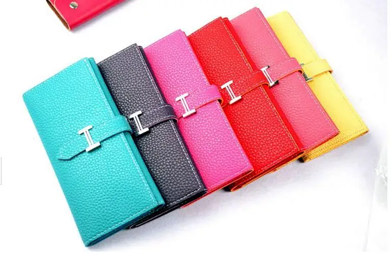 2015 new spring and summer small cosmetic bag clutch hand shoulder diagonal blue and white national wind Ms. packet