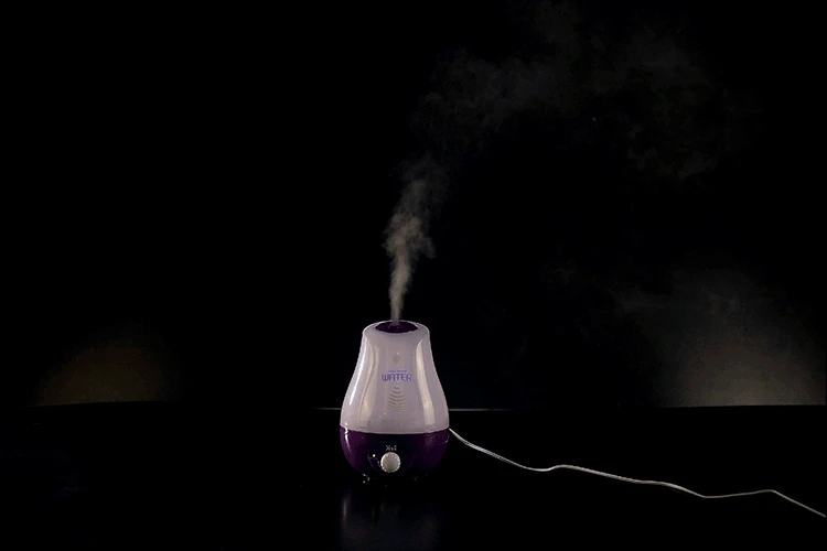 Atomizing humidity sensor transducer