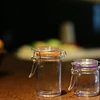 Mini glass canister sets with flip lid round glass spice jar with clamp lid
