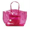 Light red vinyl handle bag in clear material XYL-H156