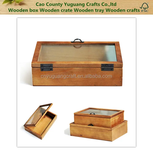 varnished wooden box with glass top
