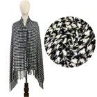 The classic black and white checked shawl is super soft and light scarf
