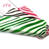 white and green striped milk flavor candy lollipop