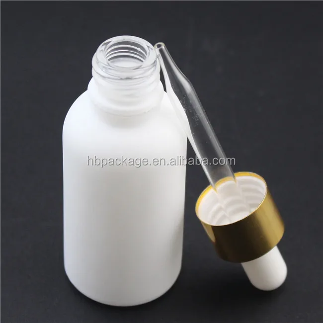 white essential oil dropper bottle