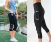 H-3080 Wholesale summer polyester grid seven running sports fitness side pocket phone three sections of gauze yoga pants