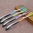 Soft Toothbrush Design Soft Bristled Adult Novelty Toothbrush with Tongue Cleaner from Yangchen Factory in Yangzhou China