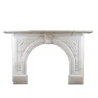 An Antique Victorian Arched Fireplace Surround In White Statuary Marble