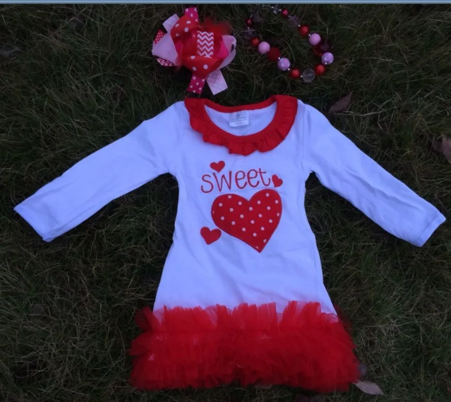 dress with matching hair bows and chunky necklace set