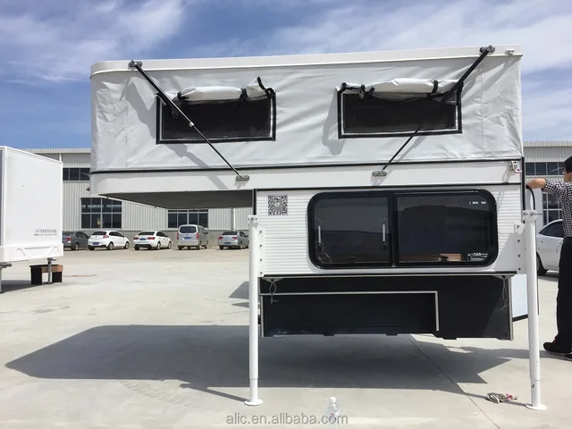 a pop-up camper,pop-upcamper pickup truck pop up tent off road camper