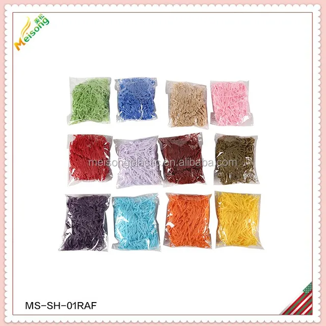 raffia and pet shred ribbon filling gift basket decorations