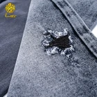 Roll of cheap 100% cotton colored denim fabric