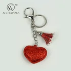 cheap custom fashion heart shaped pu and sequin tassel leather keychain