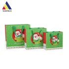 Wholesale customized paper christmas gift bag for packaging