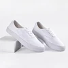 China OEM No Brand Flat All White Canvas Skate Sneaker Shoes Unisex Men Women