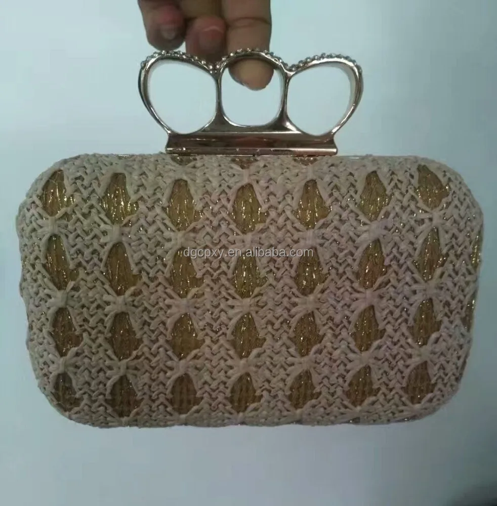 knuckle clutch bag