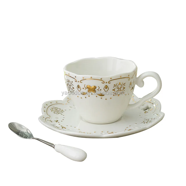 coffee cup and saucer gold