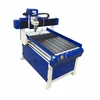 China JD 6060 Mini CNC Router Factory Price Automatic Tool Changer 3D Wood CNC Router 6090 4 Axis CNC Router