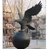 life size hot casting bronze eagle on ball statue outdoor metal sculpture
