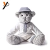 Plush toy wear white linen skirt and light blue hair cap grey bear
