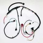 Headlight wire harness assembly for yard machine