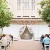 RK outdoor wedding ceremony used white draping