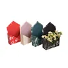 Colorful ink paper hand holding envelope flowers wedding flower box