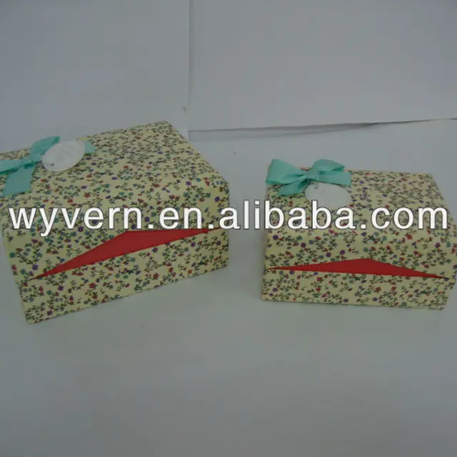 delicate gift paper box with ribbon