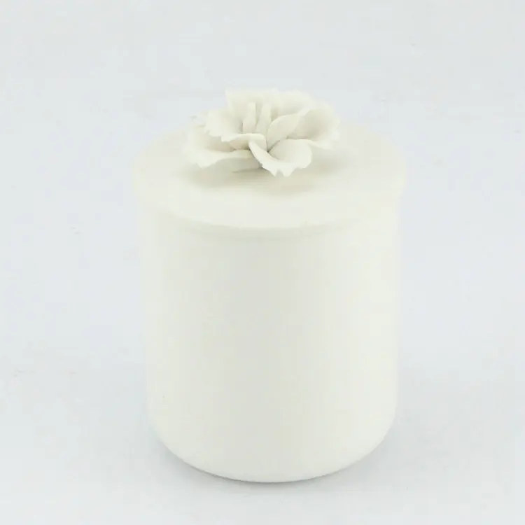 Frosted white unglazed differing sizes ceramic candle jar with lid.JPG