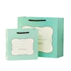 Yilucai Paper Material and Rope Handle Style white gloss laminated printed paper bags for cosmetics