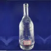 Clear glass whiskey bottle with cork