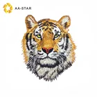 The tiger head hand embroidery design for clothing