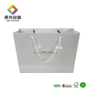 white clothing paper bag