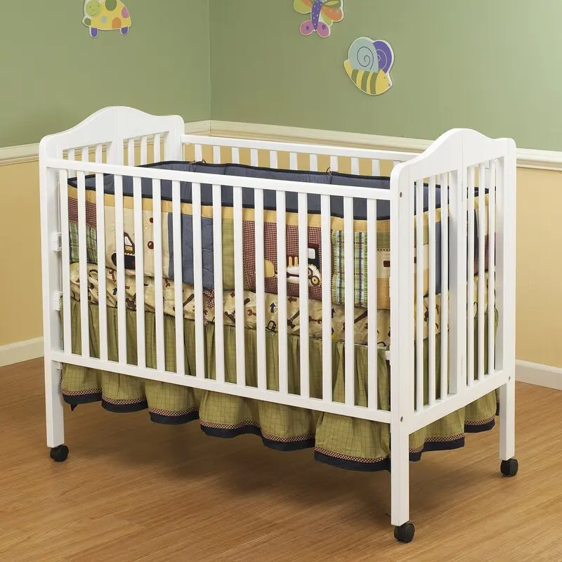 Factory Direct Selling Baby Crib with Drawer. Folding Side. White Color.