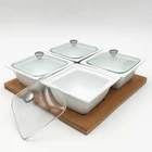 White ceramic snack bowl set with glass lid