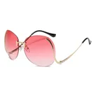 Oversized Oval Rimless Sunglasses With Metal Curved Legs Women Fashion Wholesale UV400 Sun Shades Glasses Female