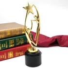 China Manufacturer Gold Star Artistic Human Modeling Black Crystal Base Metal Award Trophy