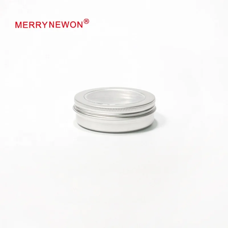 small metal tins with clear lids