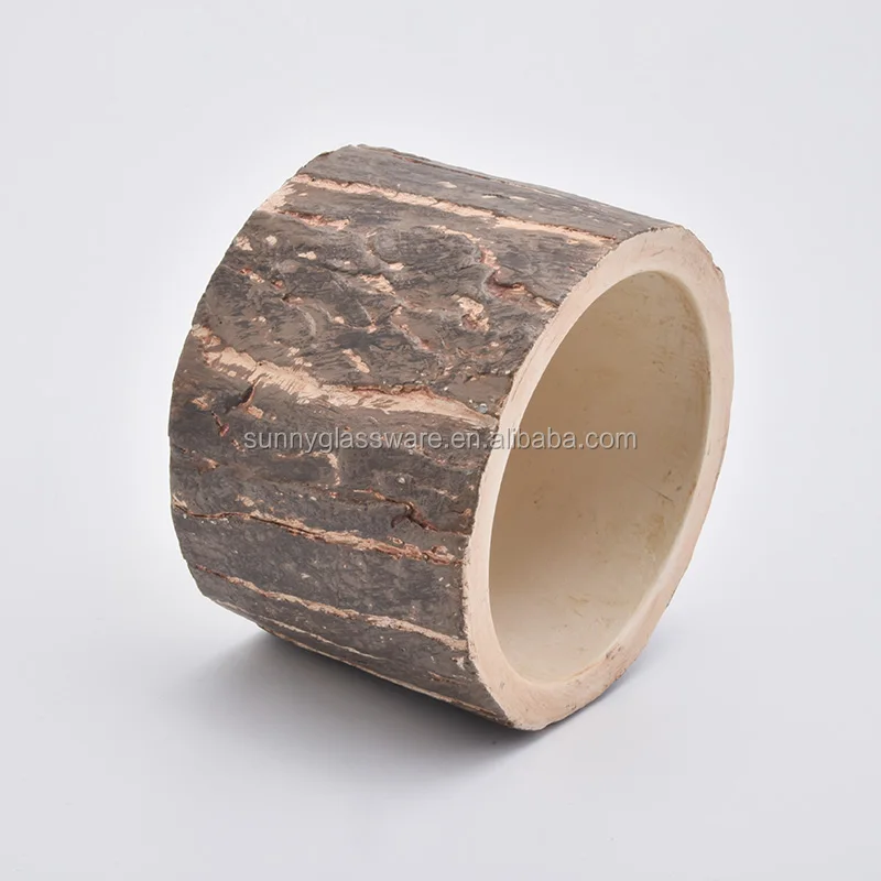 short concrete candle containers with tree design